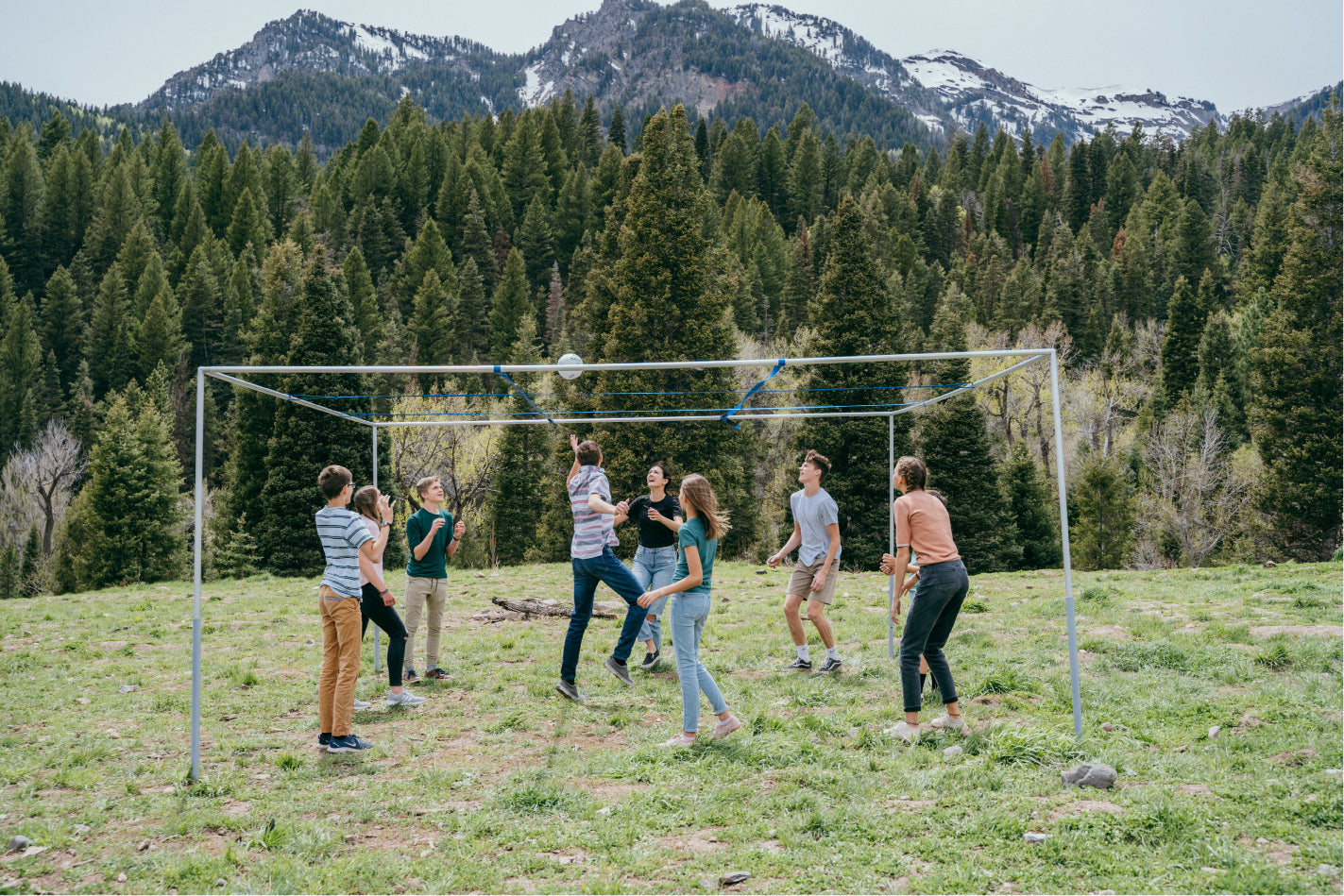 People playing 9 Square in a field